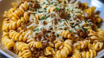 Cheesy Garlic Twisted Pasta with Cajun Ground Beef and Alfredo Velveeta
