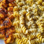 Cheesy Alfredo Twisted Pasta with Golden Garlic Butter Chicken in Creamy Sauce