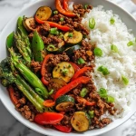 Spicy Ground Beef Stir-Fry Bowl with Garlic Veggies & Steamy Rice